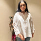 TASSLE STATEMENT SHIRT